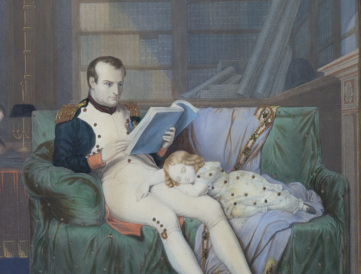 ‘Tinsel Picture’: Napoleon in his study reading, the young King of Rome asleep on his knee, c. 1860. Cooper Hewitt, Smithsonian Design Museum Collection. Public Domain. ‘Tinsel Picture’: Napoleon in his study reading, the young King of Rome asleep on his knee, c. 1860. Cooper Hewitt, Smithsonian Design Museum Collection. Public Domain.