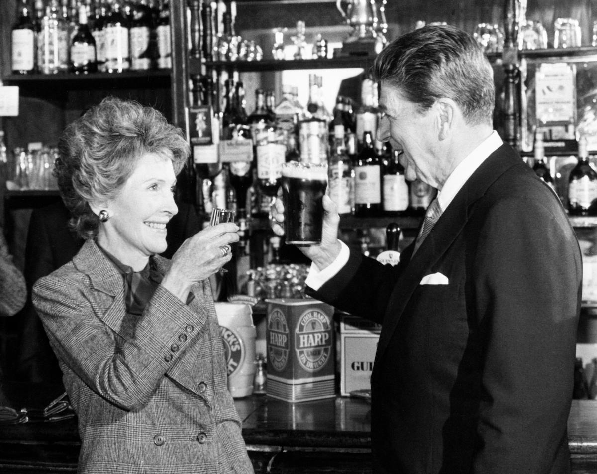 President Ronald Reagan and wife Nancy toast each other at the bar of O'Farrell's Pub in Ballyporeen, while on a four day visit to the Republic of Ireland, 3 June 1984. PA Images/Alamy Stock Photo. President Ronald Reagan and wife Nancy toast each other at the bar of O'Farrell's Pub in Ballyporeen, while on a four day visit to the Republic of Ireland, 3 June 1984. PA Images/Alamy Stock Photo.